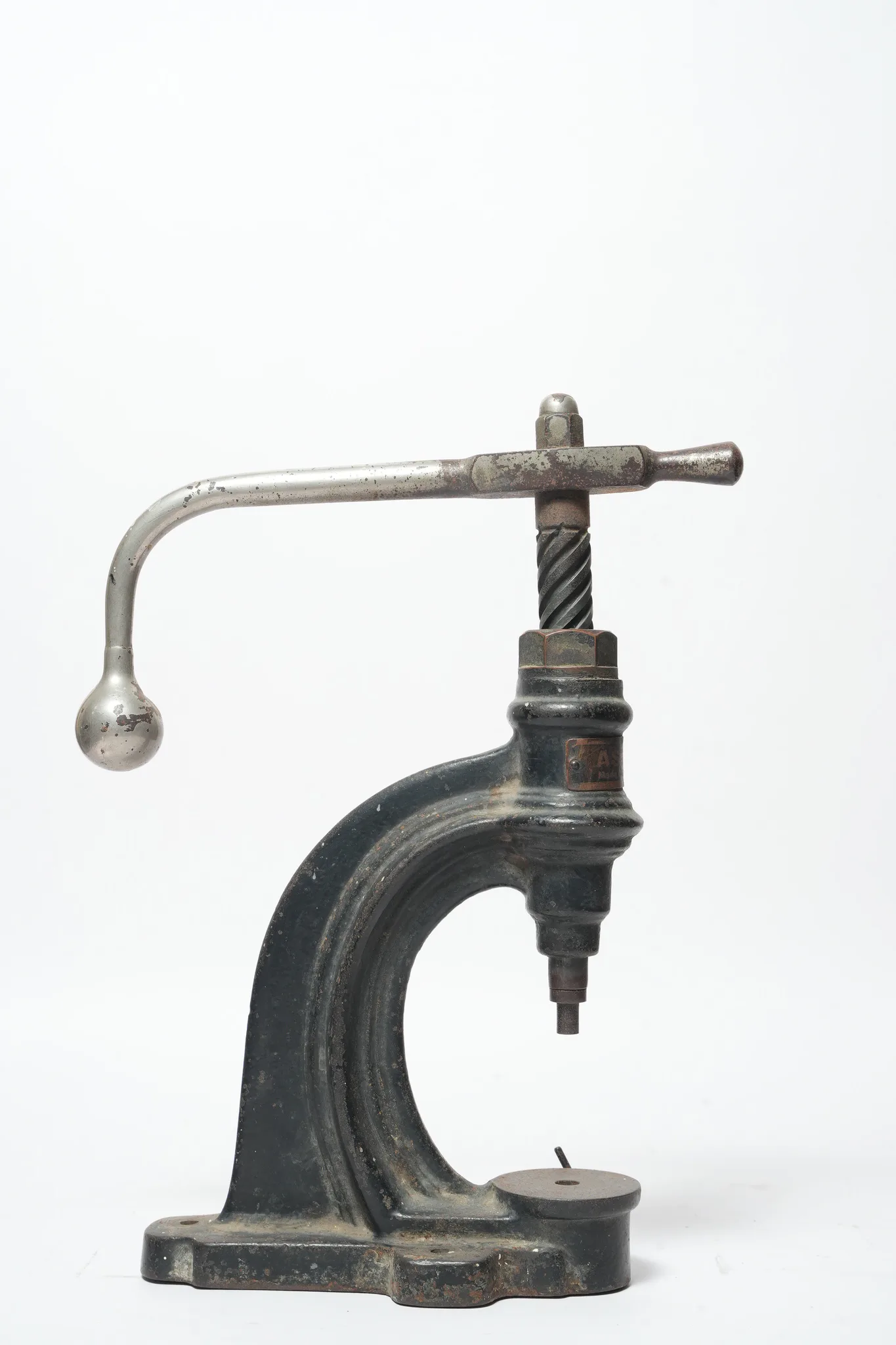 Astor No. 2 Cast Iron Spindle Button Press — photograph 2