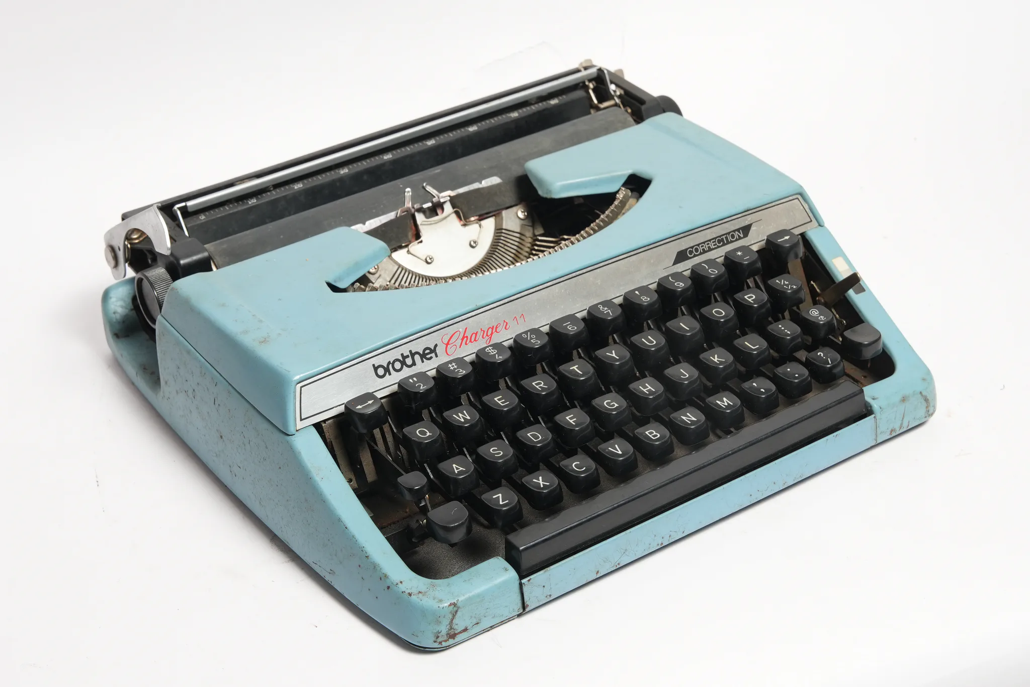 Brother Charger 11 Portable Typewriter (Blue) — photograph
