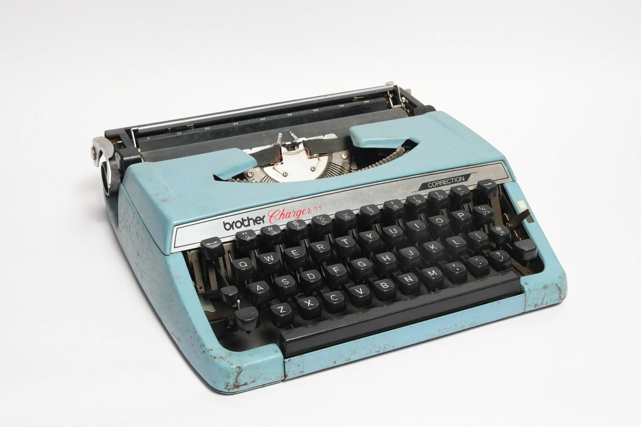 Brother Charger 11 Portable Typewriter (Blue) — photograph