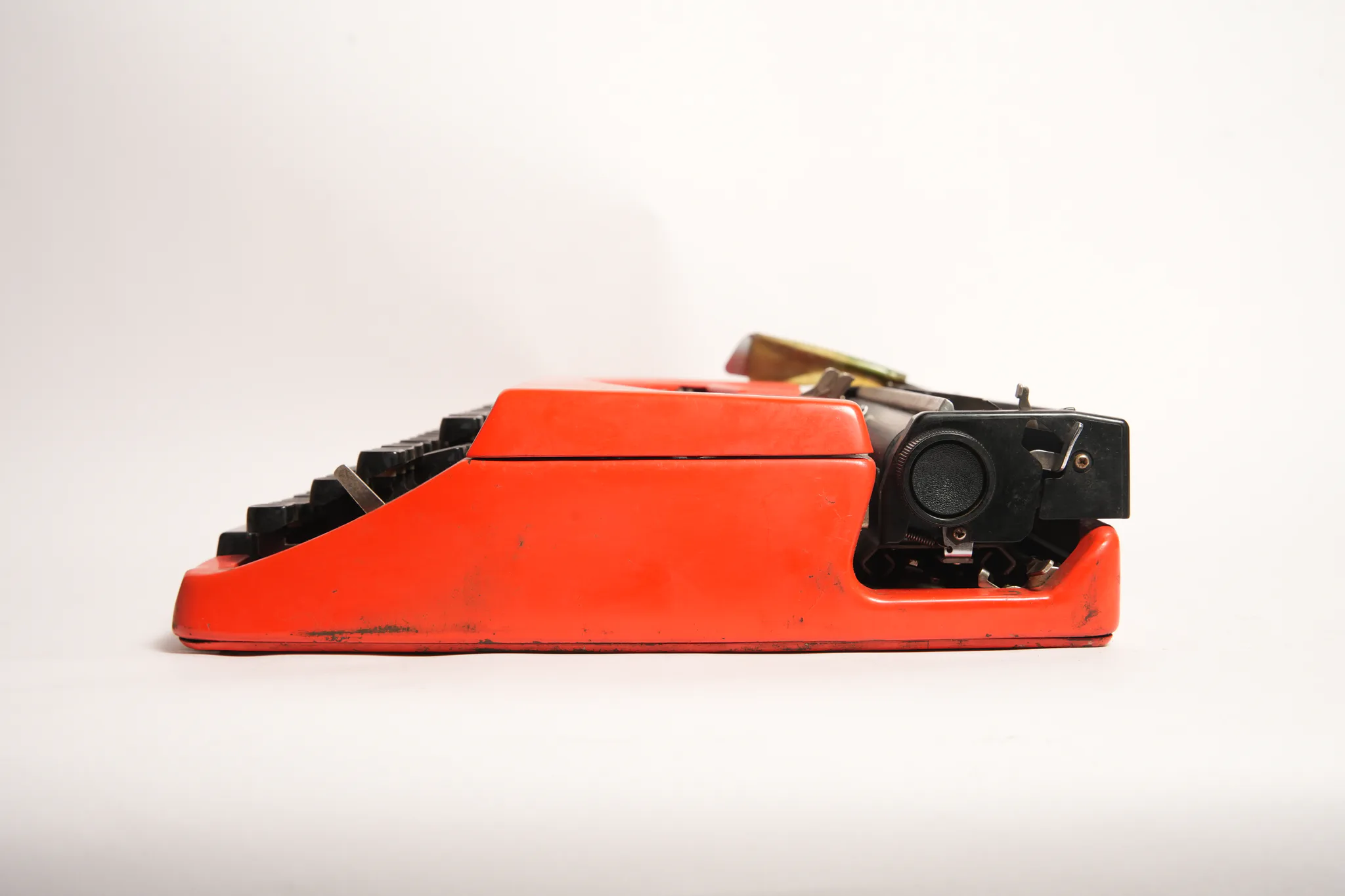 Brother Deluxe 220 Vivid Red Portable Manual Typewriter — photograph