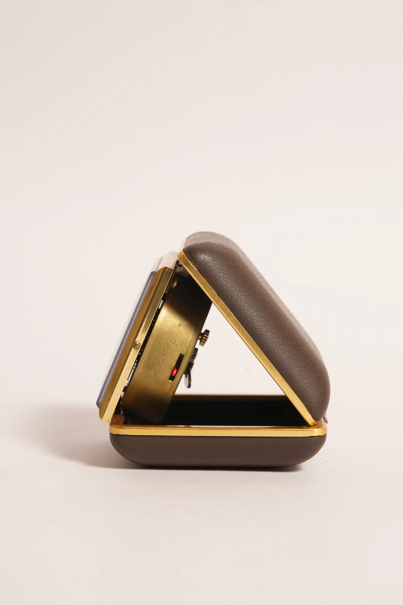 Ergo Travel Alarm Clock in Brown Leatherette Case — photograph