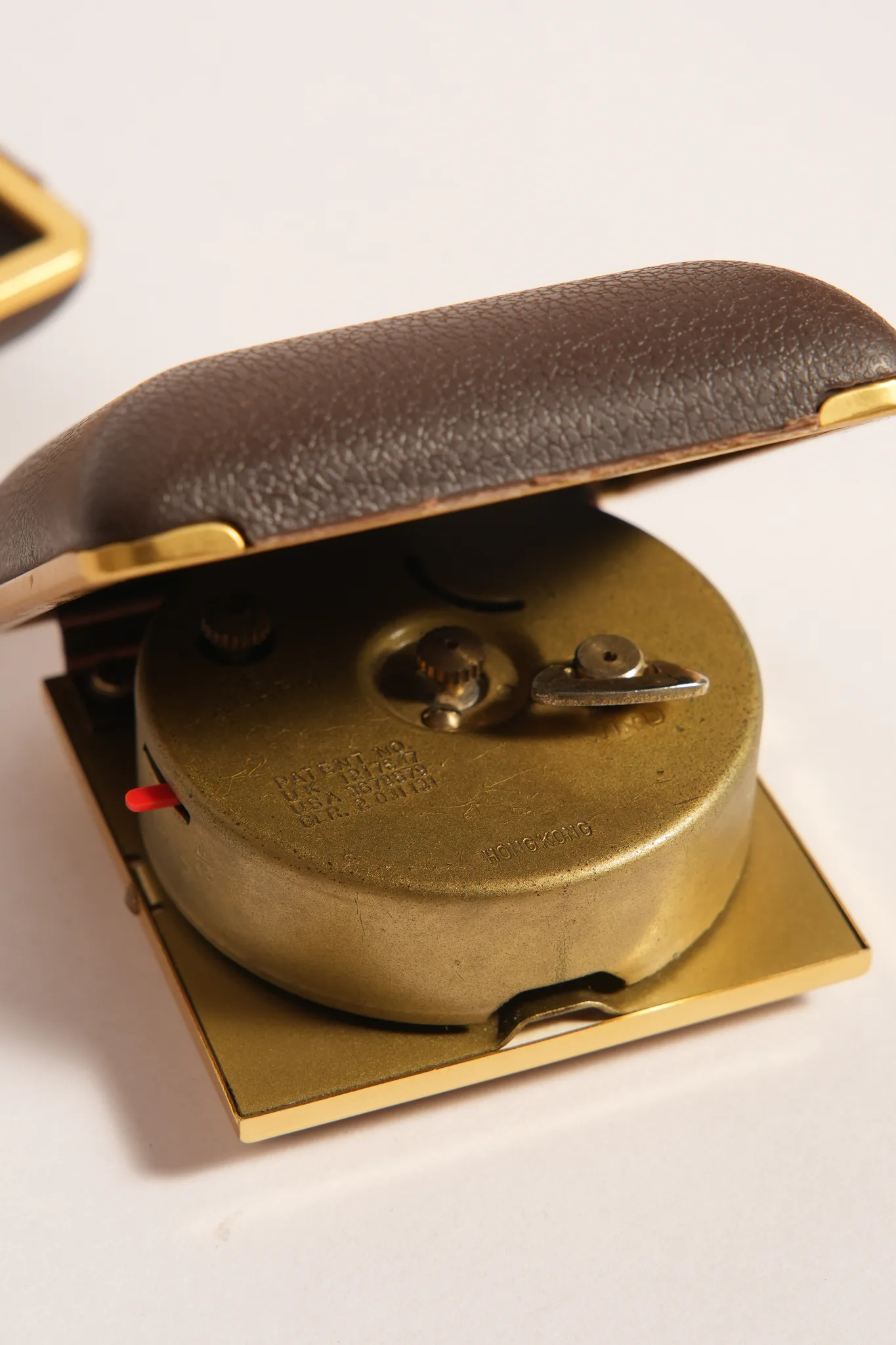 Ergo Travel Alarm Clock in Brown Leatherette Case — photograph