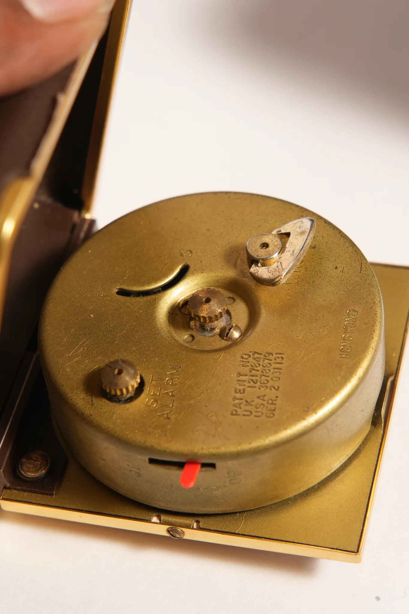 Ergo Travel Alarm Clock in Brown Leatherette Case — photograph
