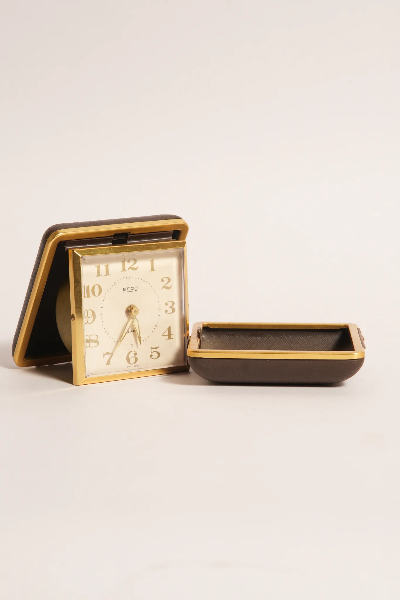 Ergo Travel Alarm Clock in Brown Leatherette Case — photograph