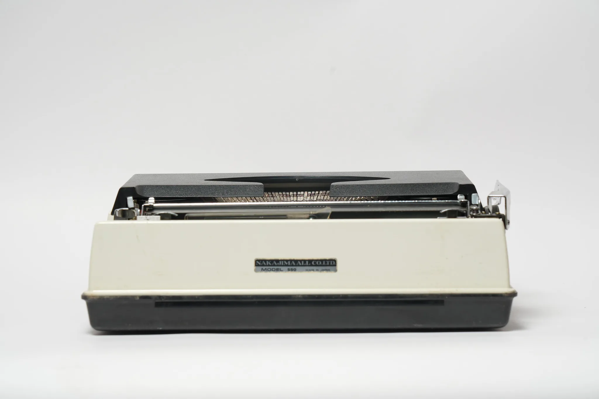 Nakajima All Model 550 Vintage Typewriter with Case — photograph