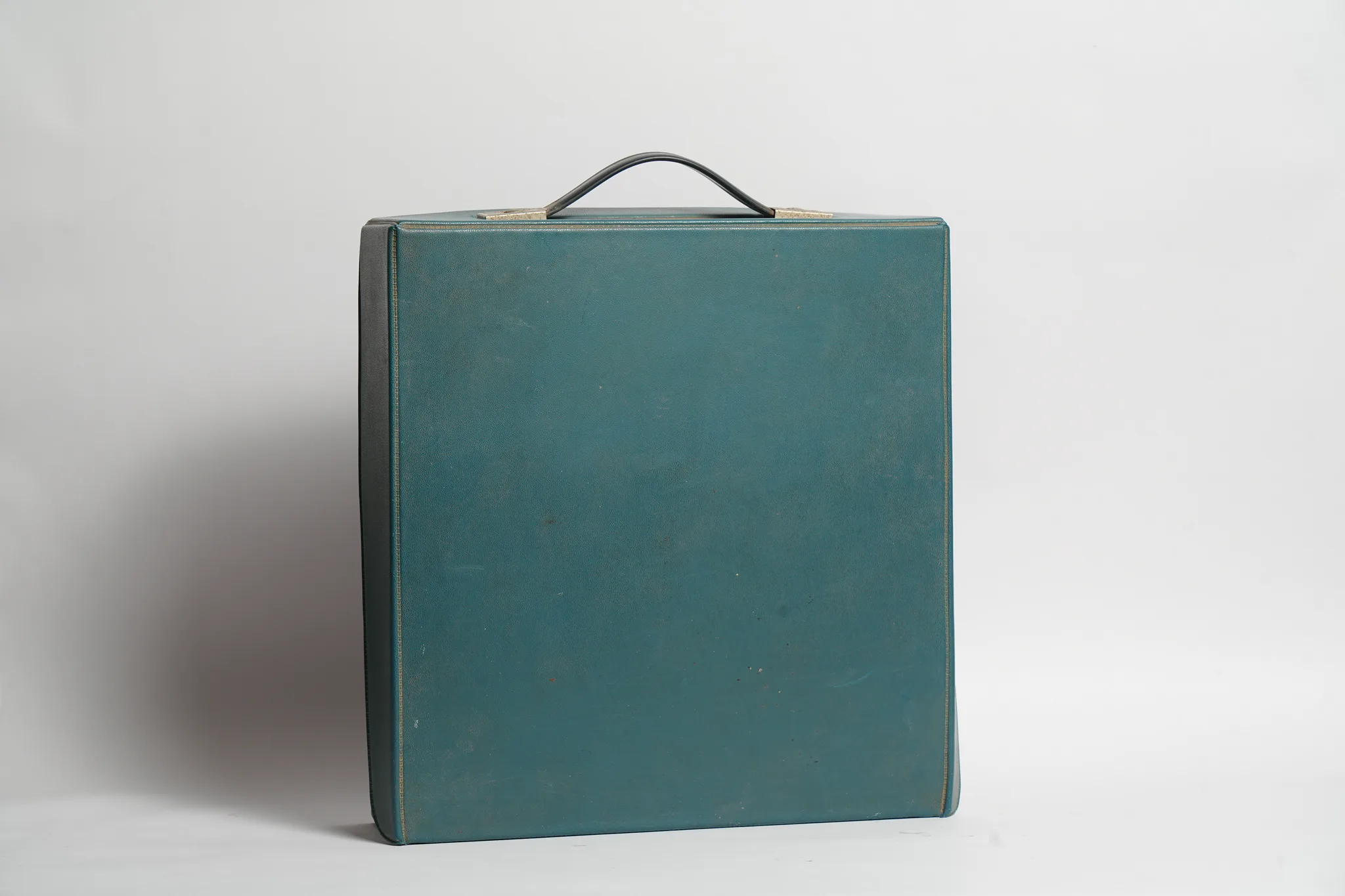 Olivetti Dora Typewriter with Teal Travel Case — photograph