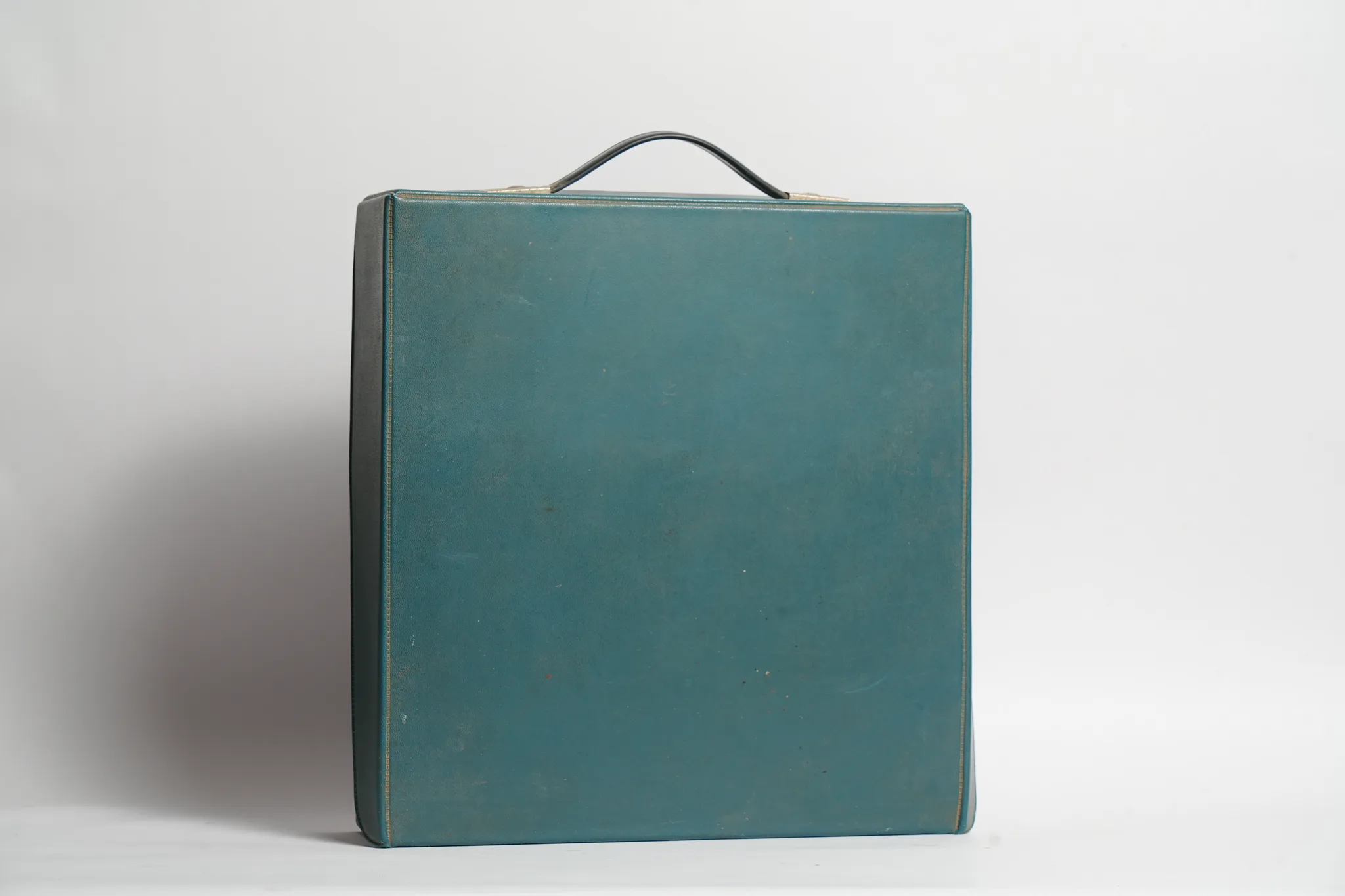 Olivetti Dora Typewriter with Teal Travel Case — photograph