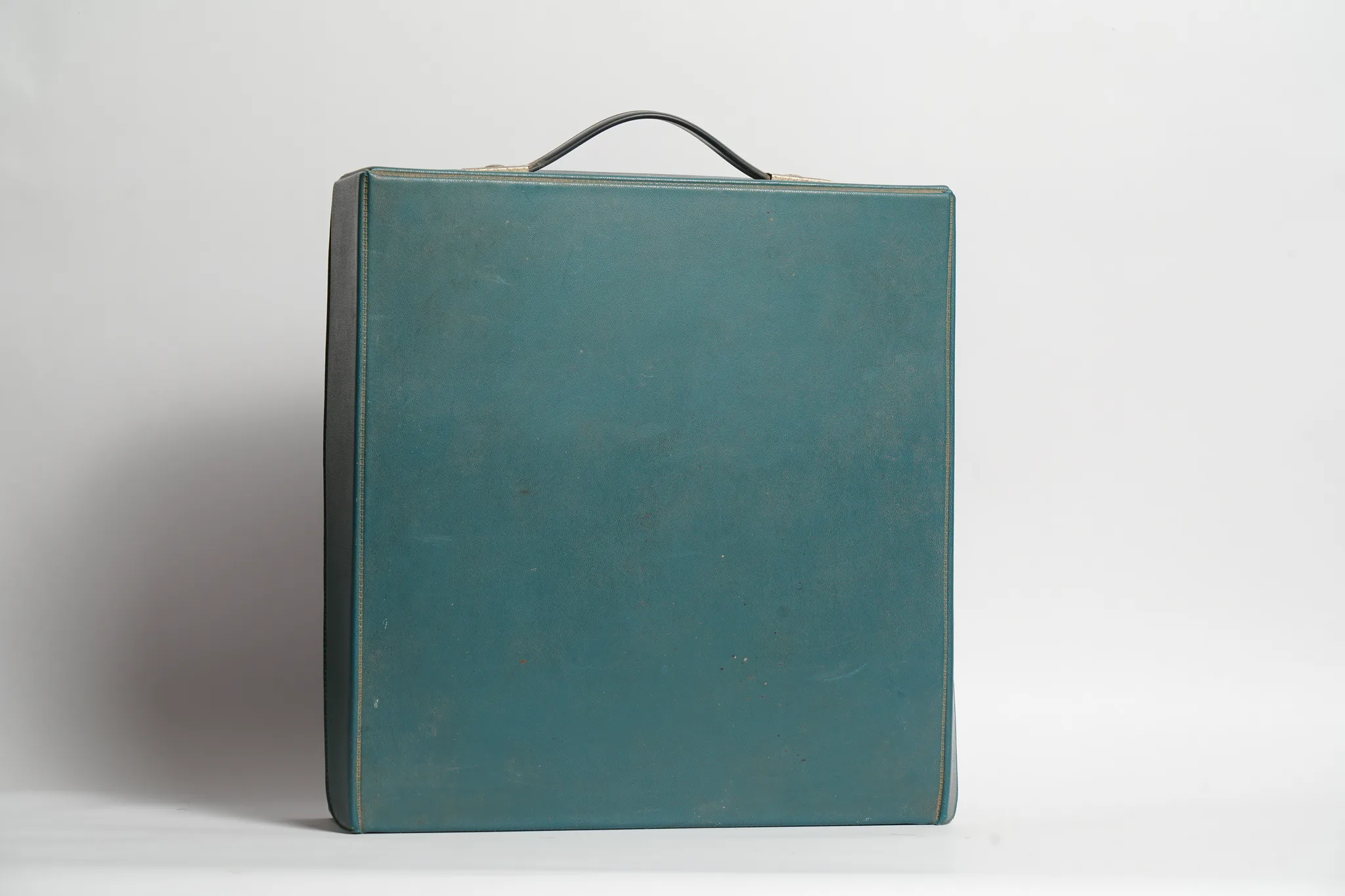 Olivetti Dora Typewriter with Teal Travel Case — photograph