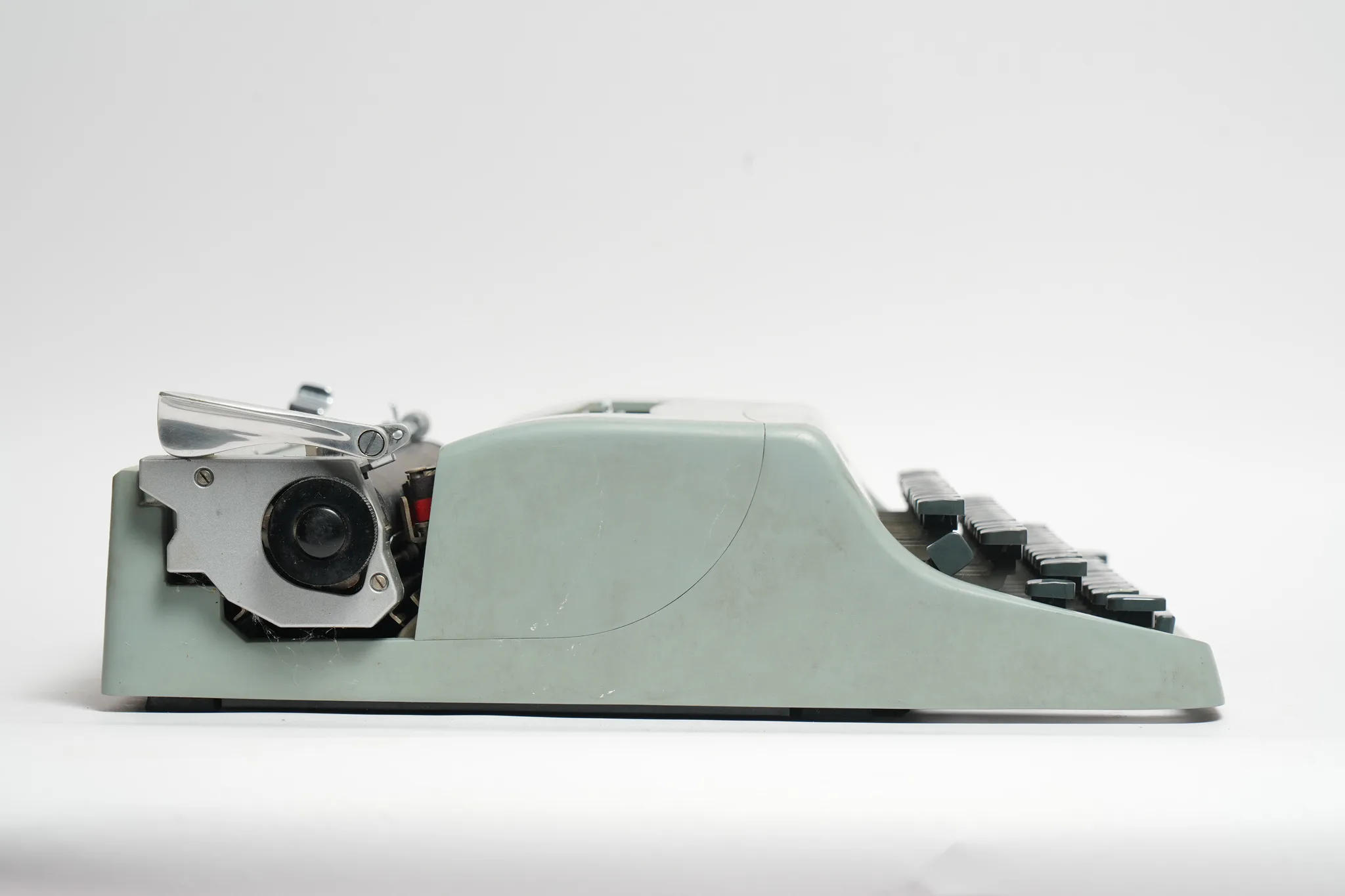 Olivetti Lettera 32 Vintage Sage Green Typewriter — photograph