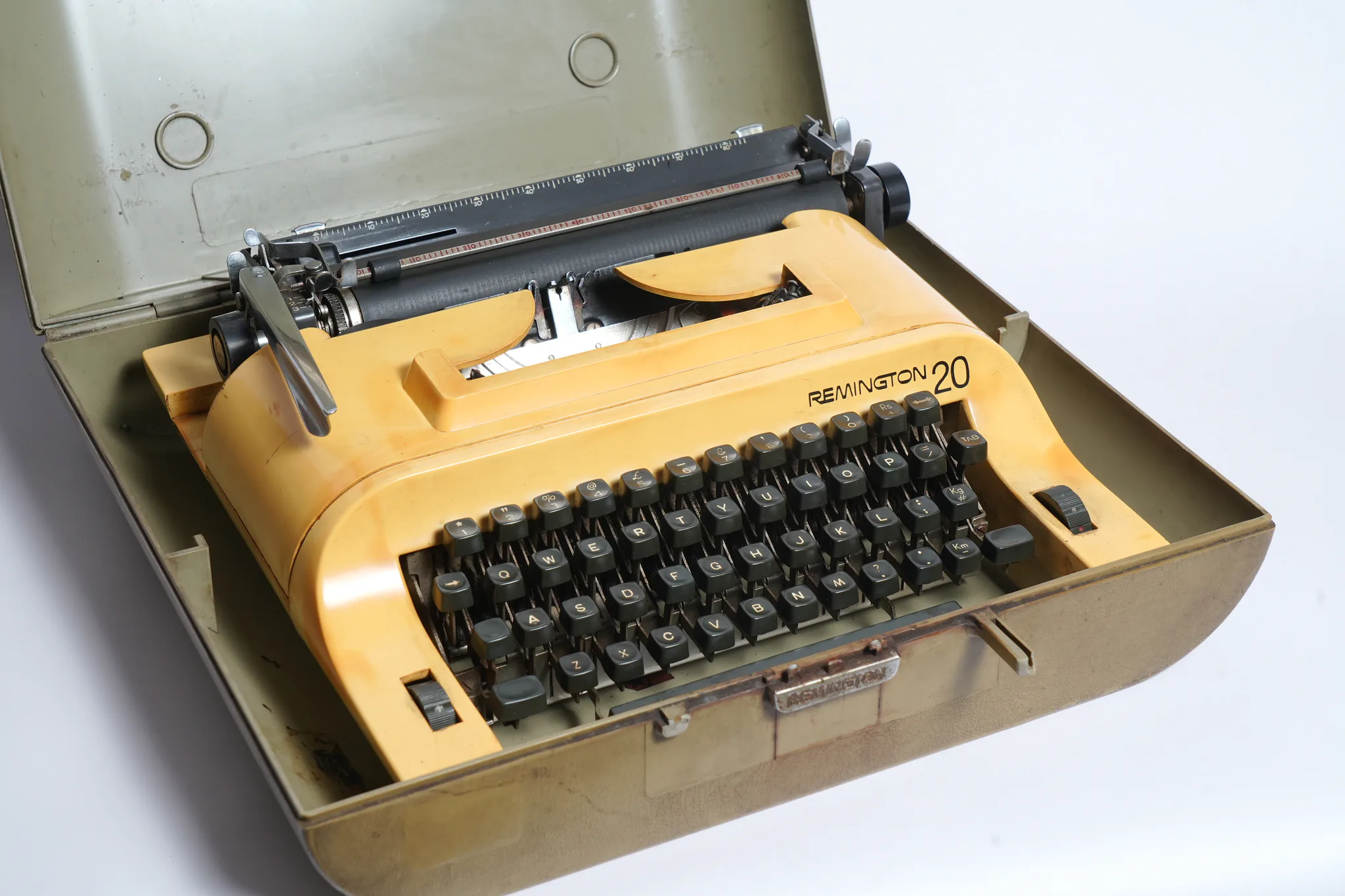 Remington 20 Mustard Yellow Portable Typewriter — photograph