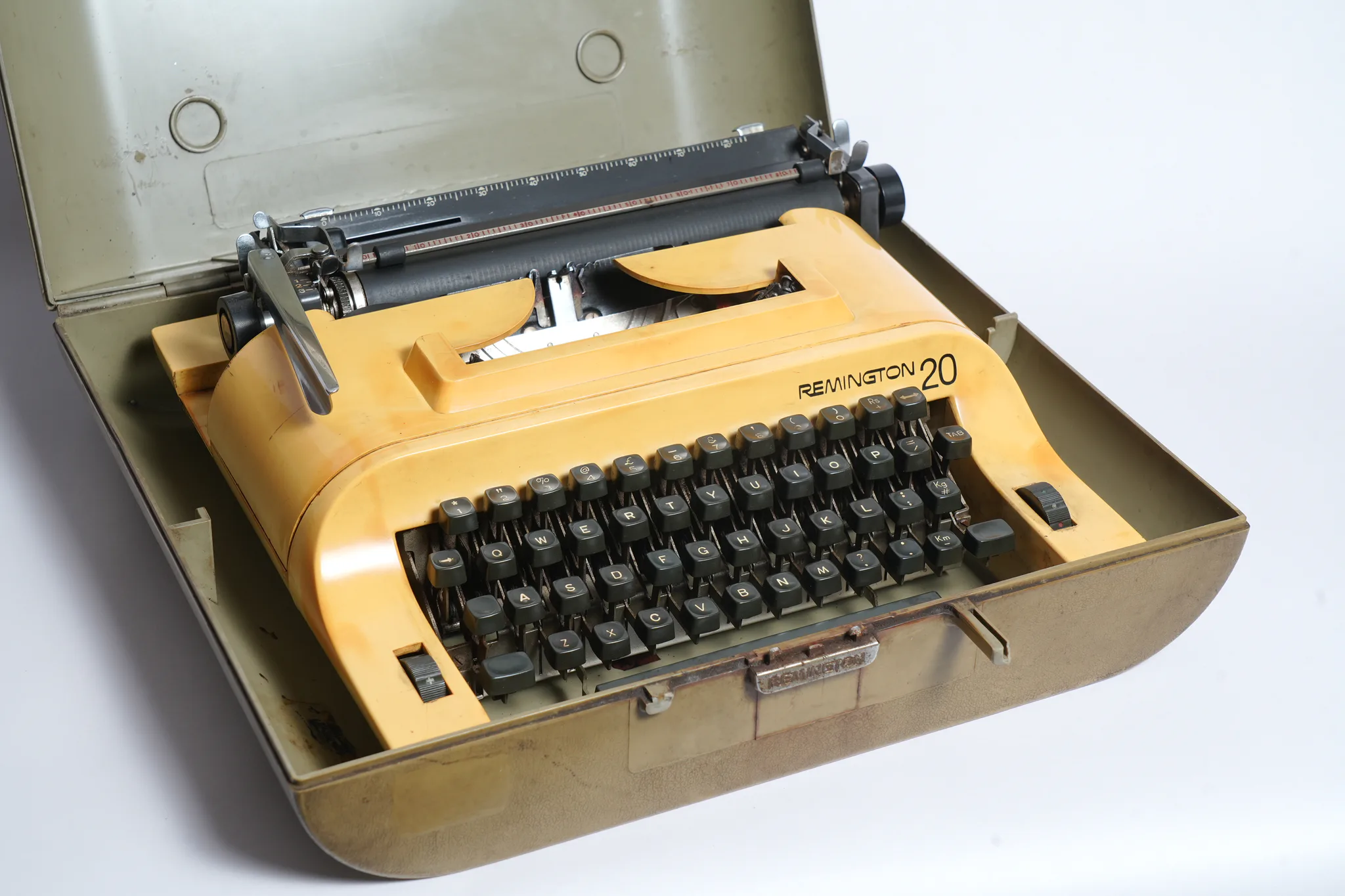 Remington 20 Mustard Yellow Portable Typewriter — photograph