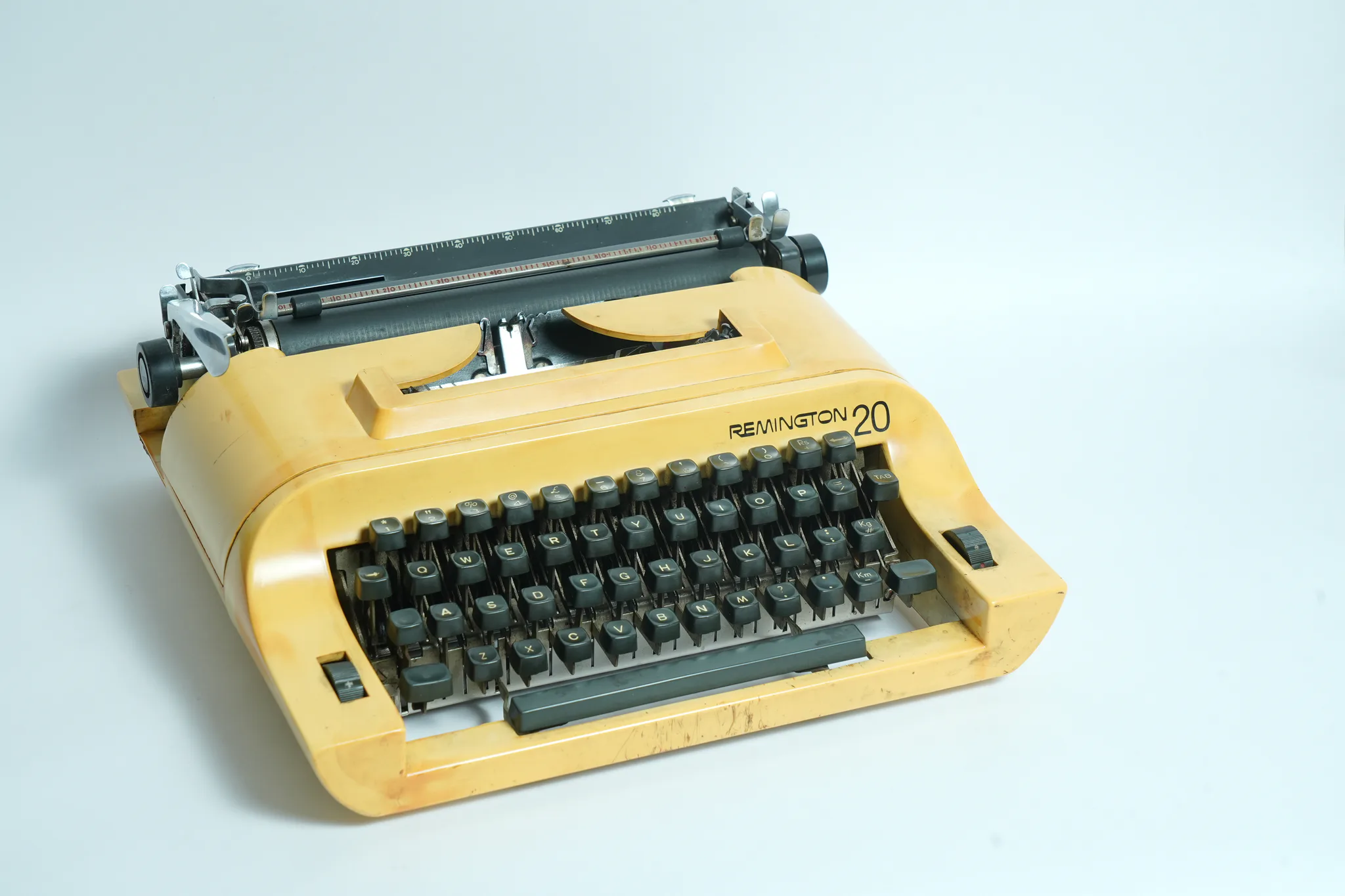 Remington 20 Mustard Yellow Portable Typewriter — photograph