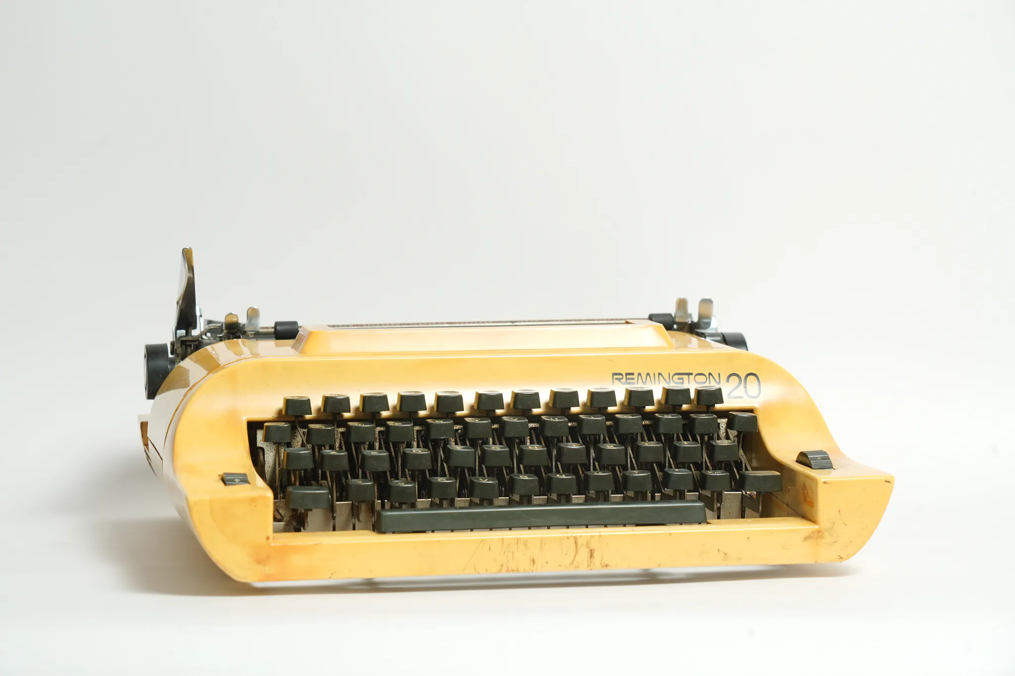 Remington 20 Mustard Yellow Portable Typewriter — photograph
