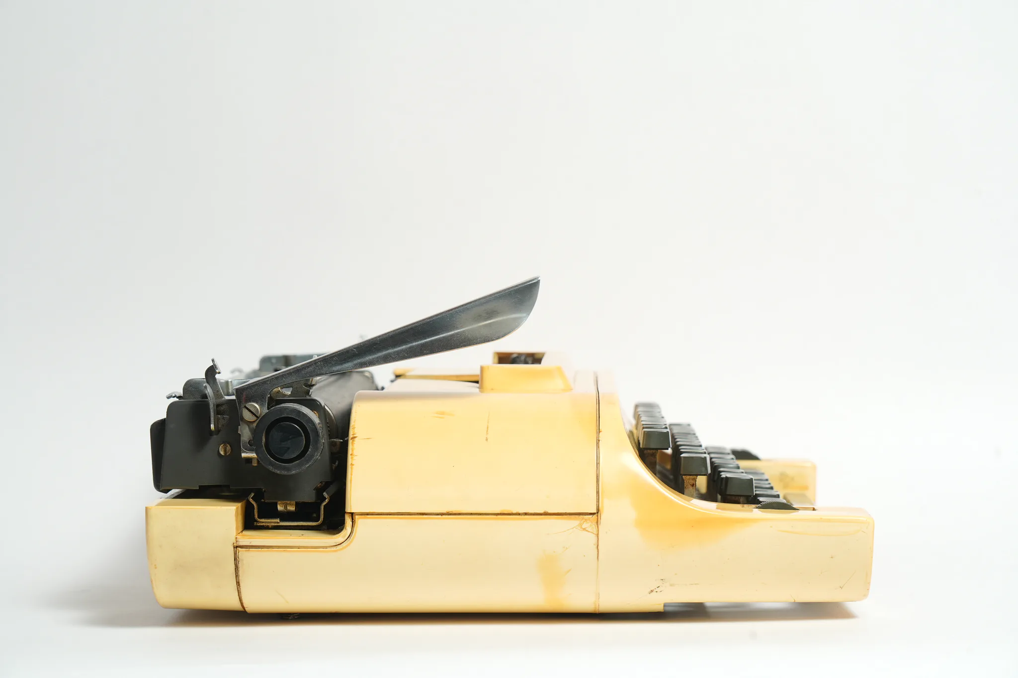 Remington 20 Mustard Yellow Portable Typewriter — photograph