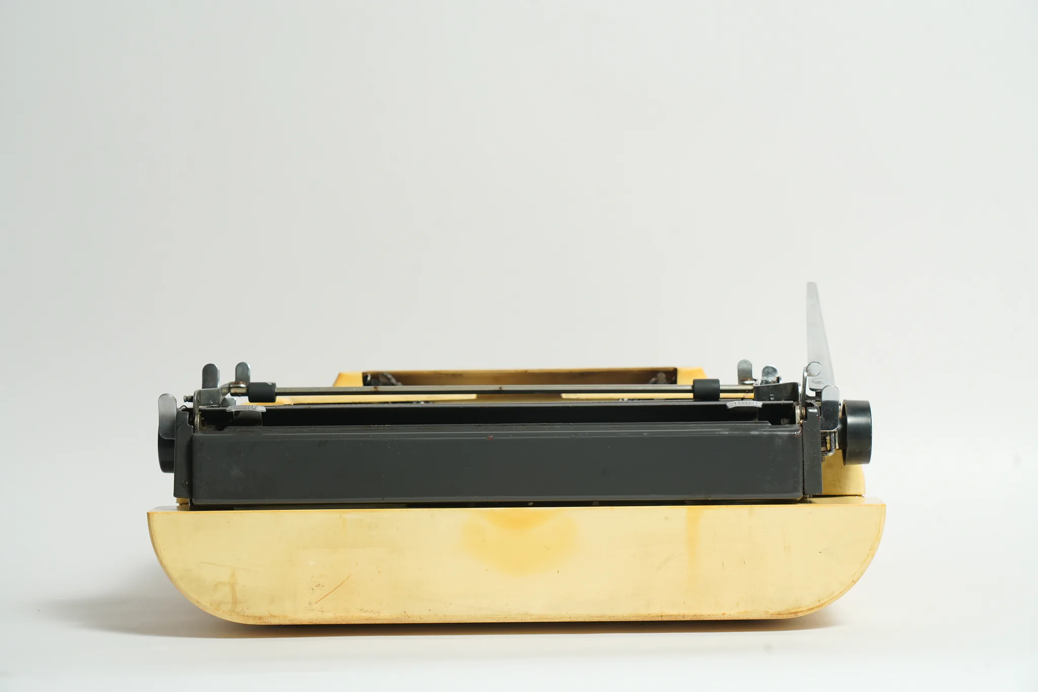 Remington 20 Mustard Yellow Portable Typewriter — photograph