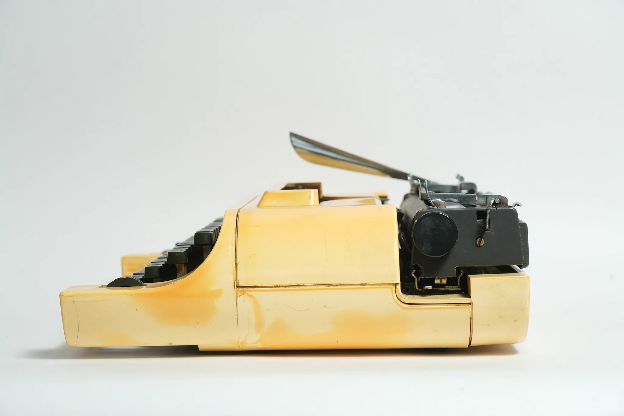 Remington 20 Mustard Yellow Portable Typewriter — photograph