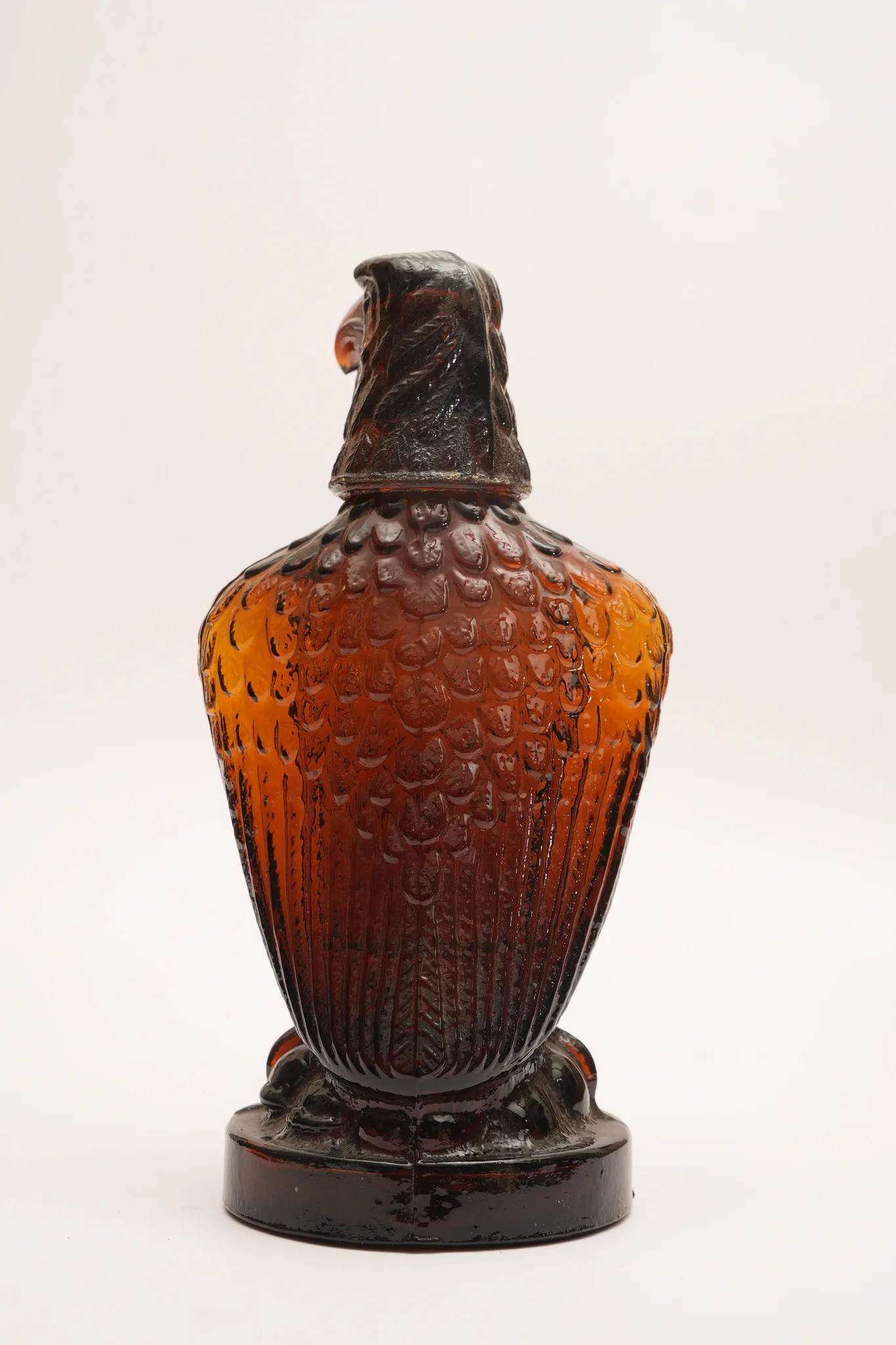 Vintage Amber Glass Eagle Figural Decanter Bottle — photograph