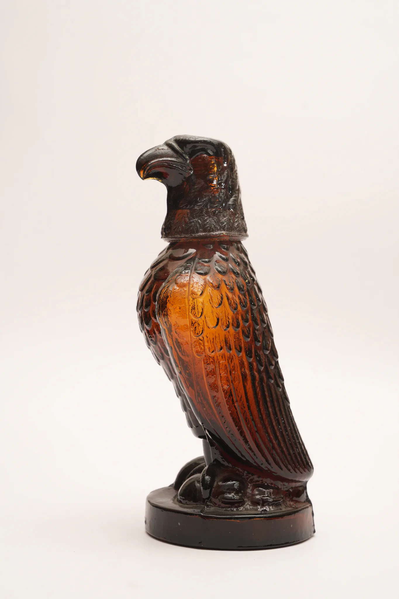 Vintage Amber Glass Eagle Figural Decanter Bottle — photograph