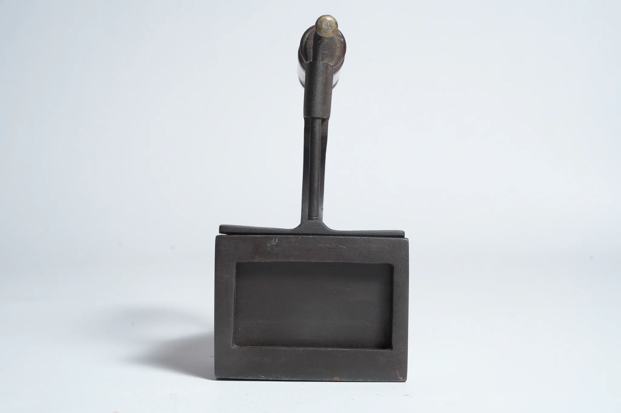 Vintage Asbestos-Handle Sad Iron with Latch Mechanism — photograph