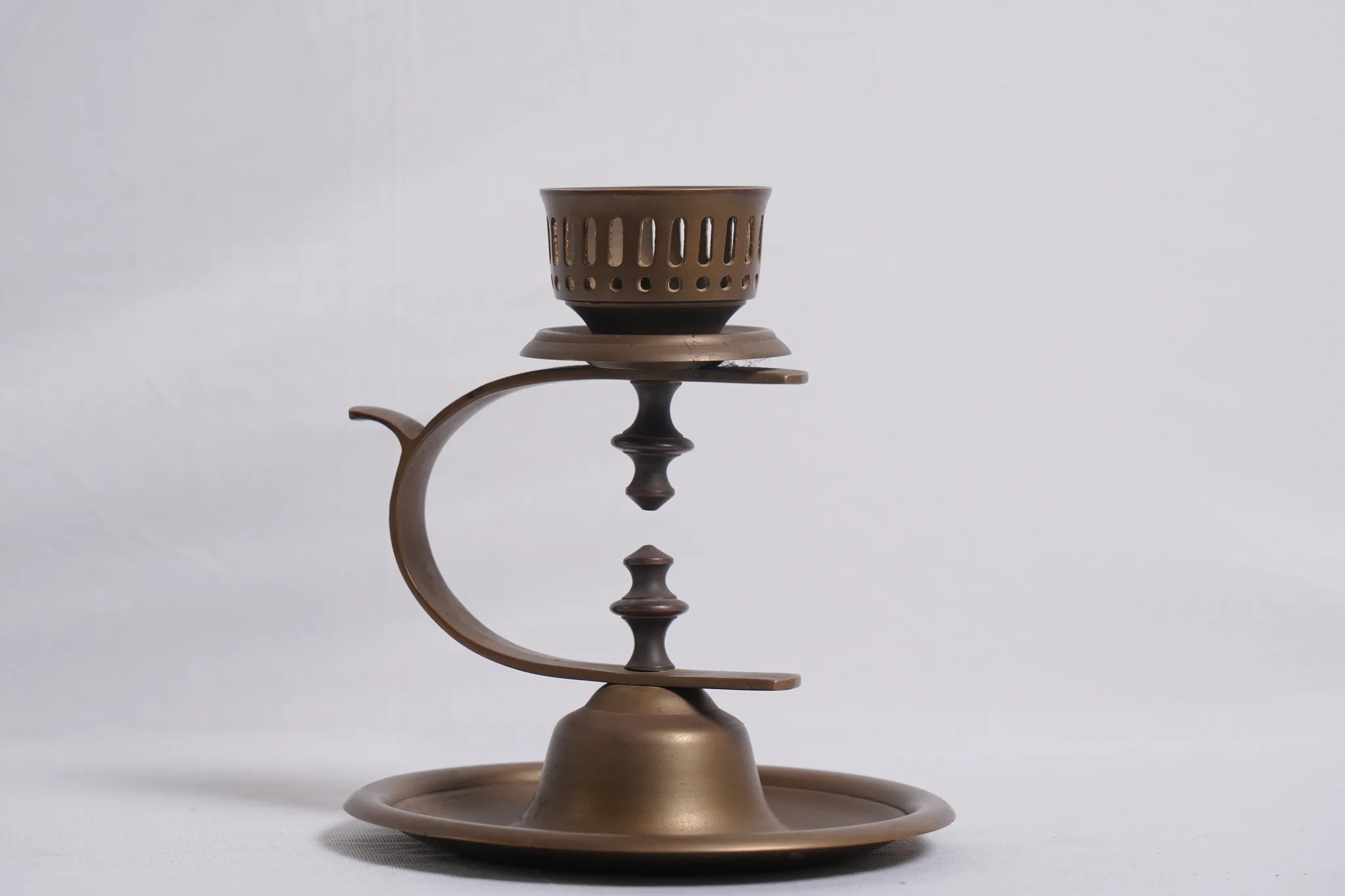 Vintage Brass Balancing Candle Holder with Counterweight — photograph