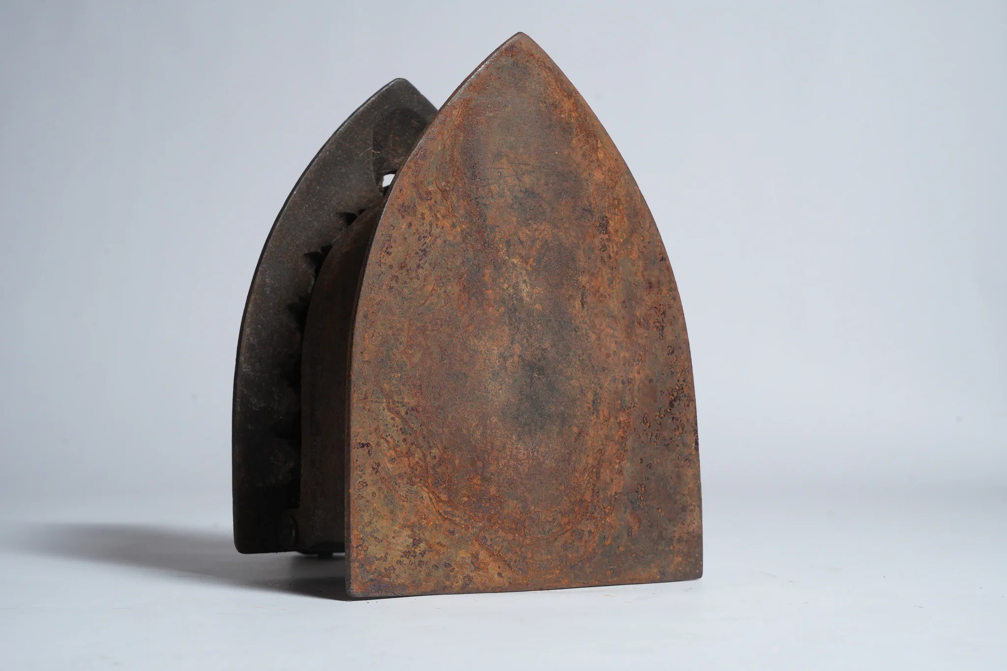Vintage Cast Iron Charcoal Flatiron (Antique Laundry Tool) — photograph