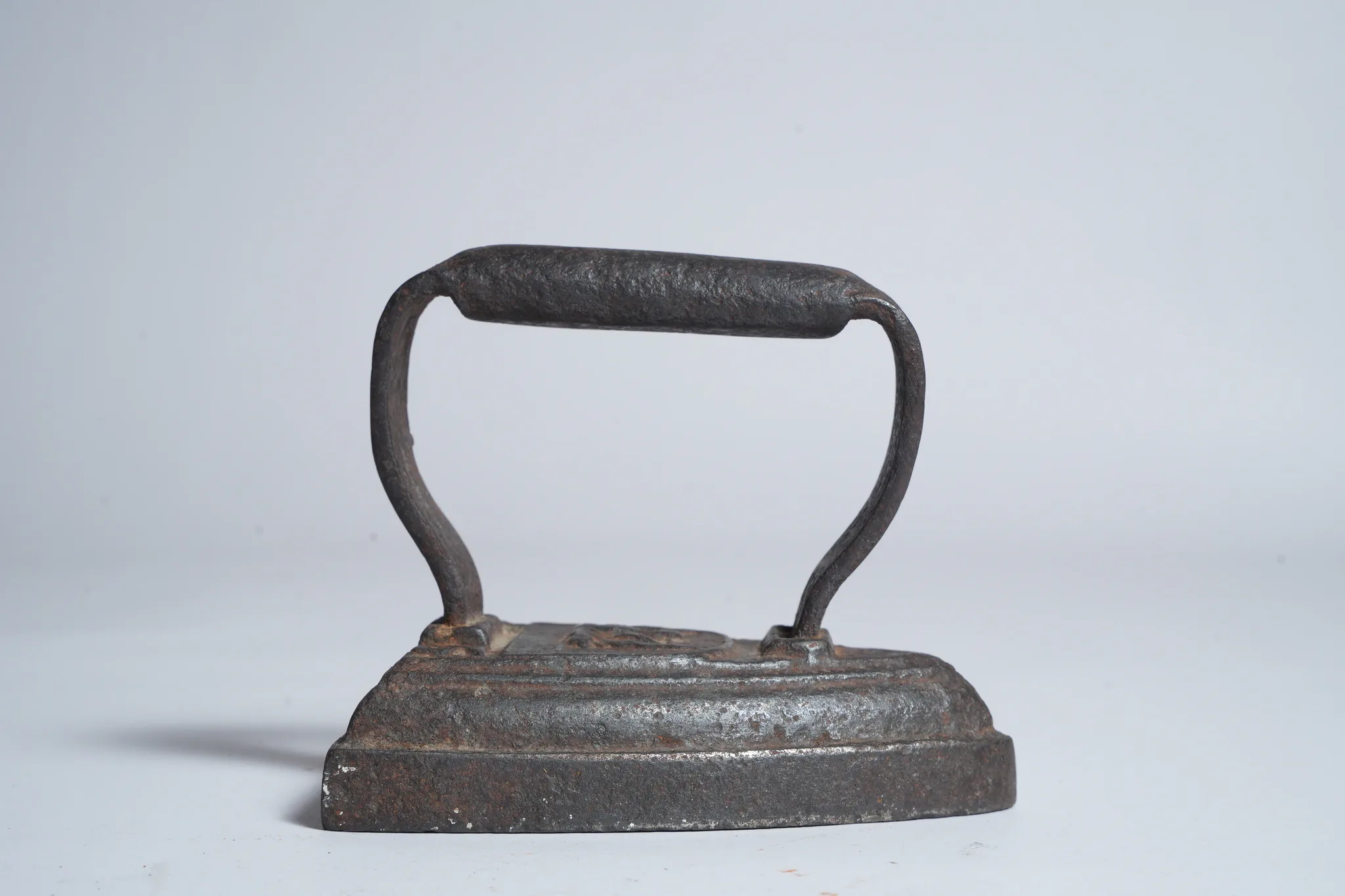 Vintage Cast Iron Sad Iron Flat Iron Clothes Press — photograph