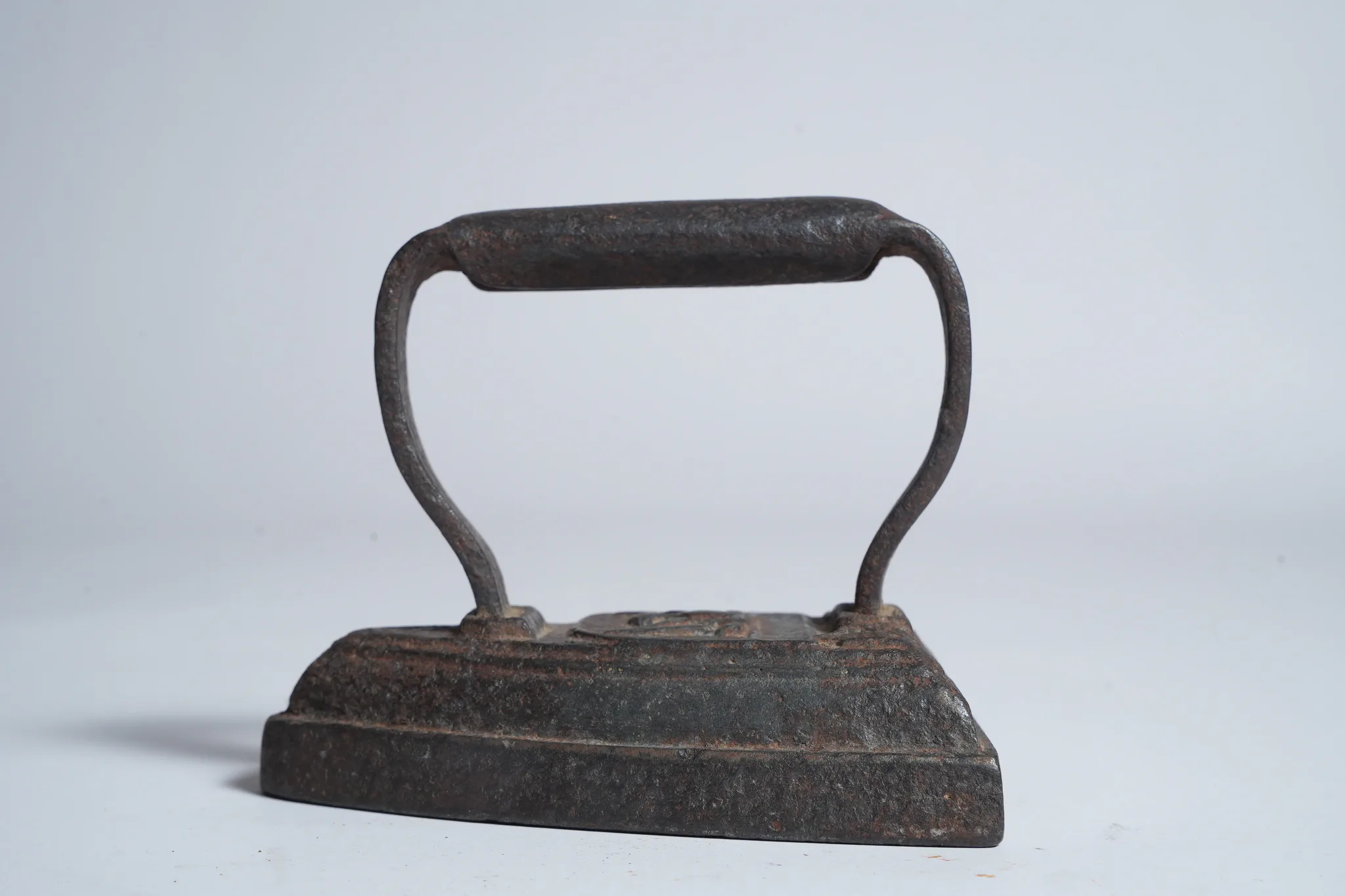 Vintage Cast Iron Sad Iron Flat Iron Clothes Press — photograph