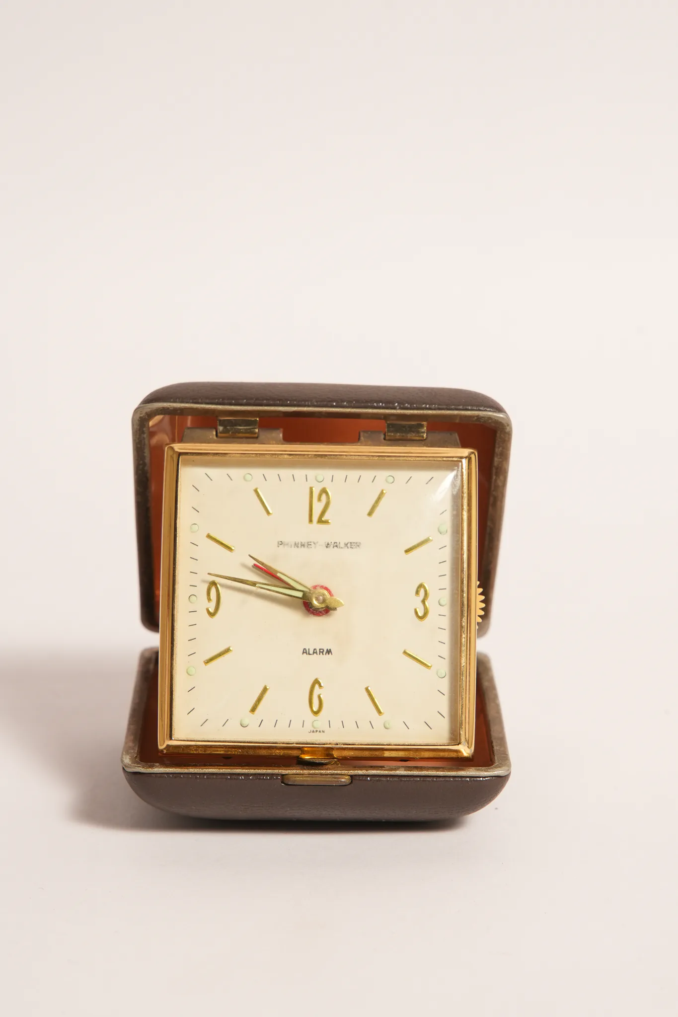 Phinney-Walker Travel Alarm Clock in Brown Case — photograph