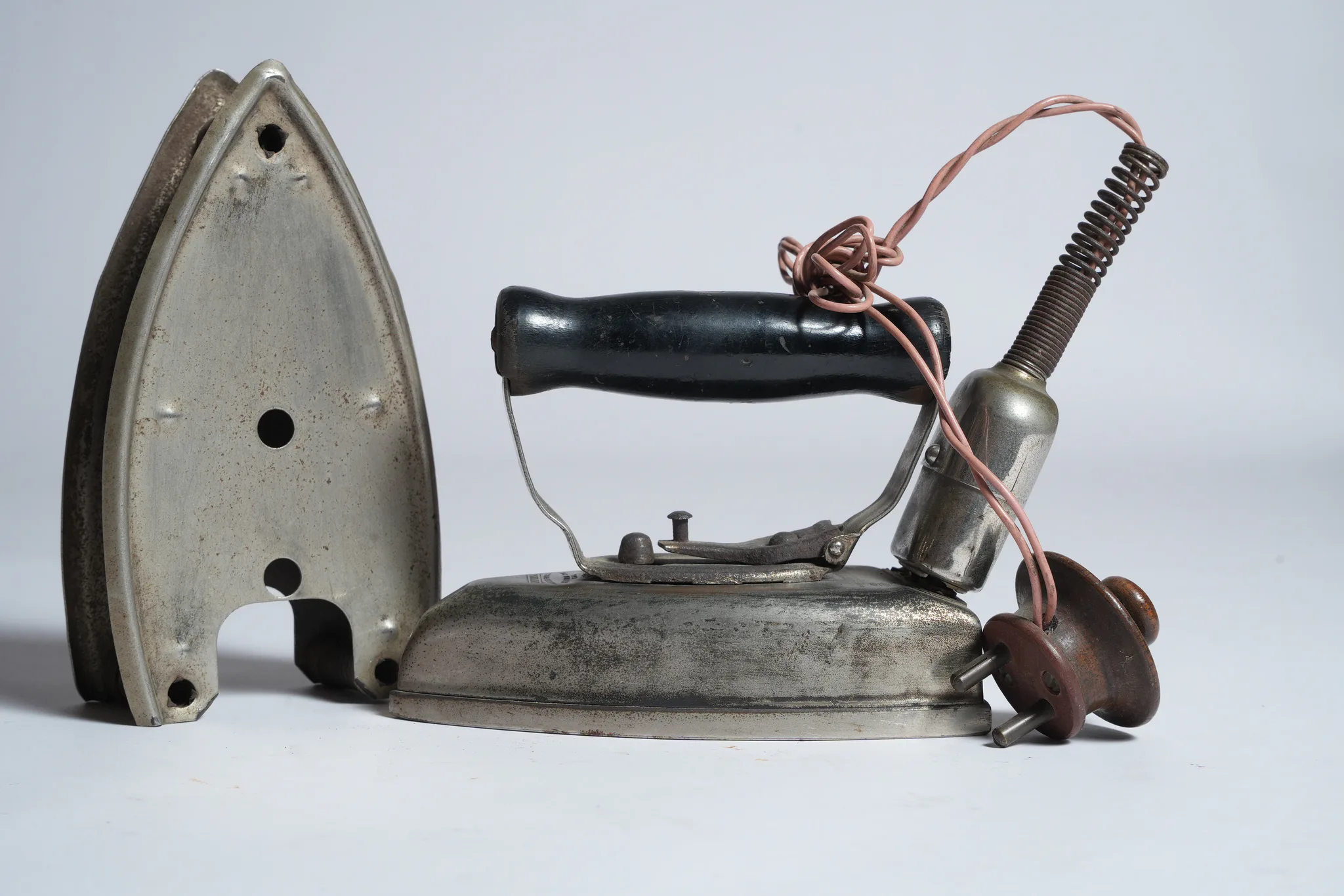 Vintage Universal Electric Iron and Curling Iron Heater Set — photograph