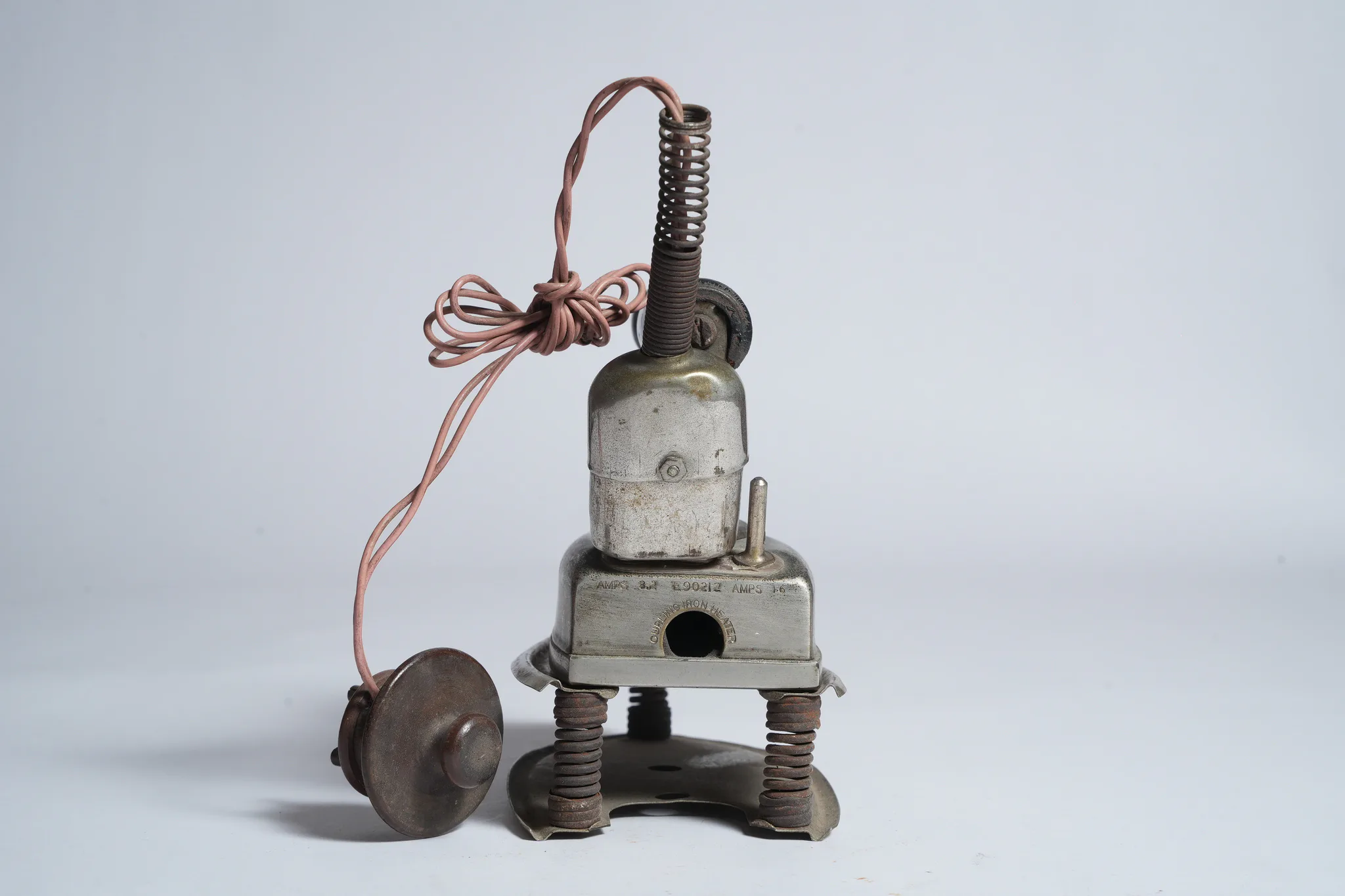 Vintage Universal Electric Iron and Curling Iron Heater Set — photograph
