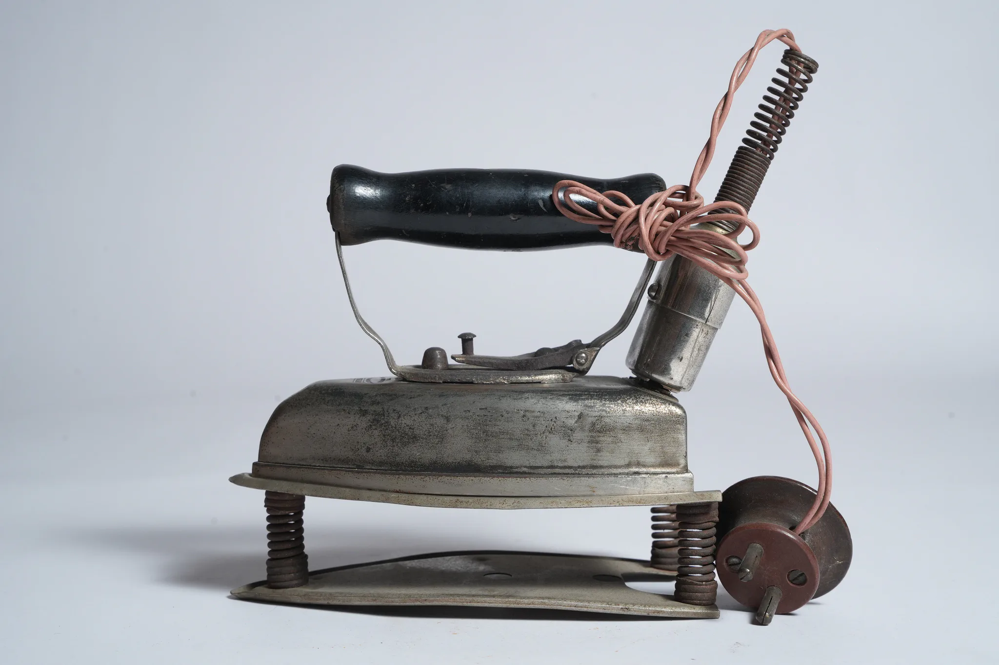 Vintage Universal Electric Iron and Curling Iron Heater Set — photograph