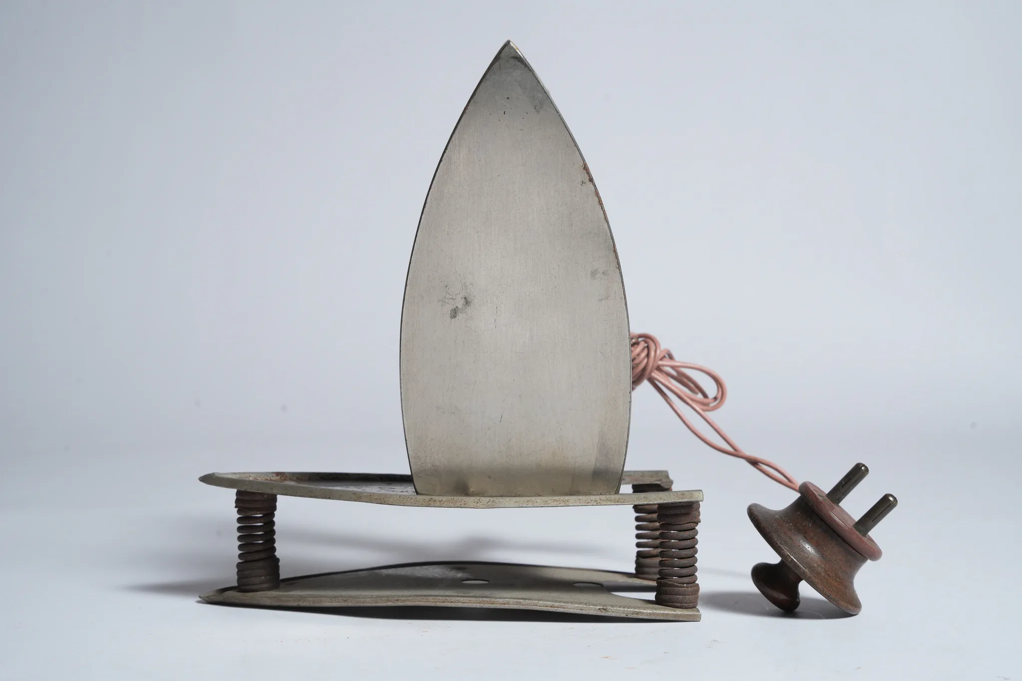 Vintage Universal Electric Iron and Curling Iron Heater Set — photograph