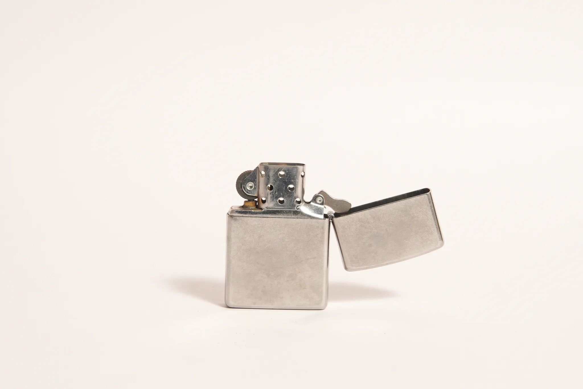 Vintage Zippo Distressed Stars & Stripes Lighter — photograph