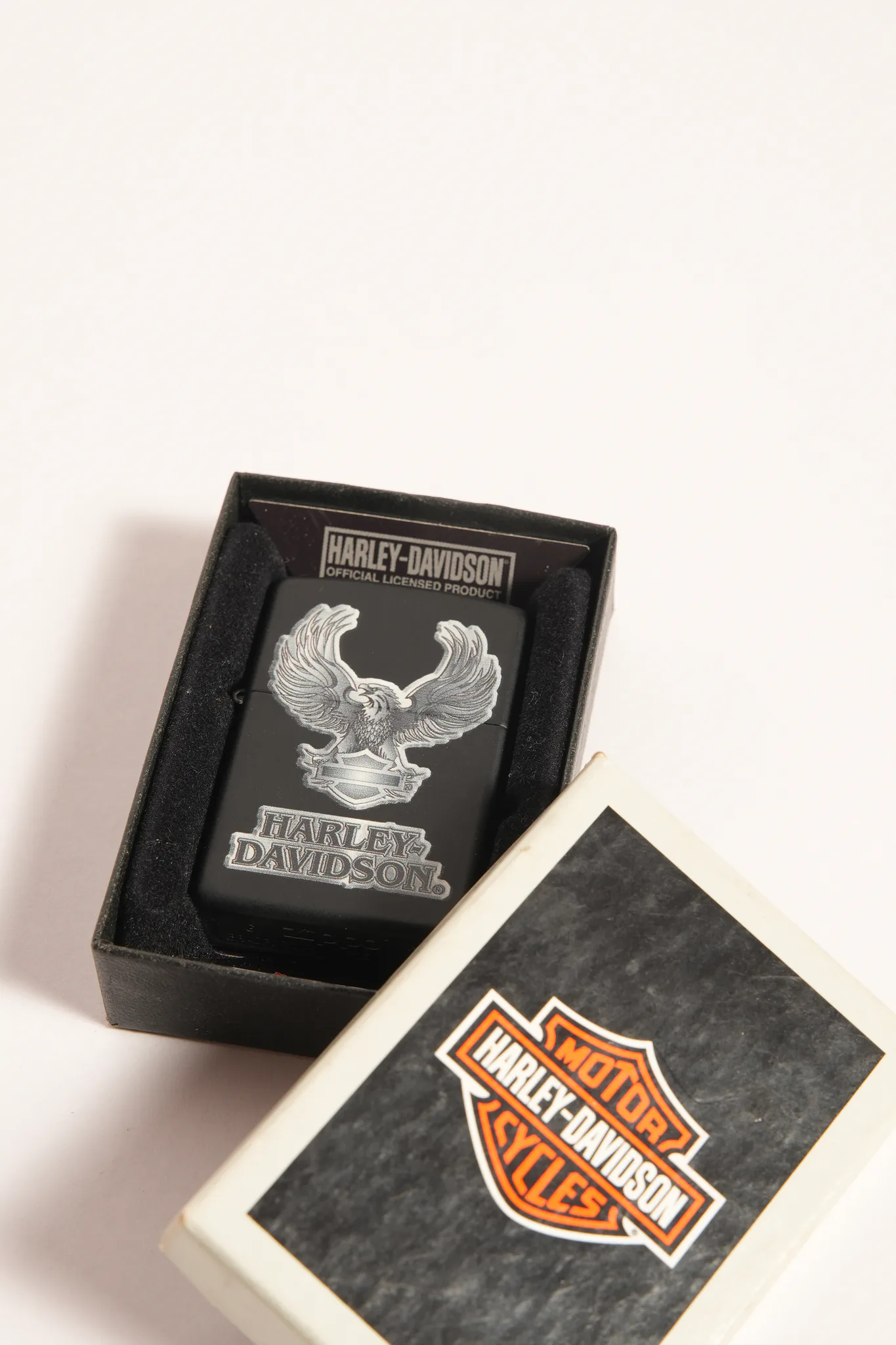Vintage Zippo Harley-Davidson Eagle Matte Black Lighter — photograph