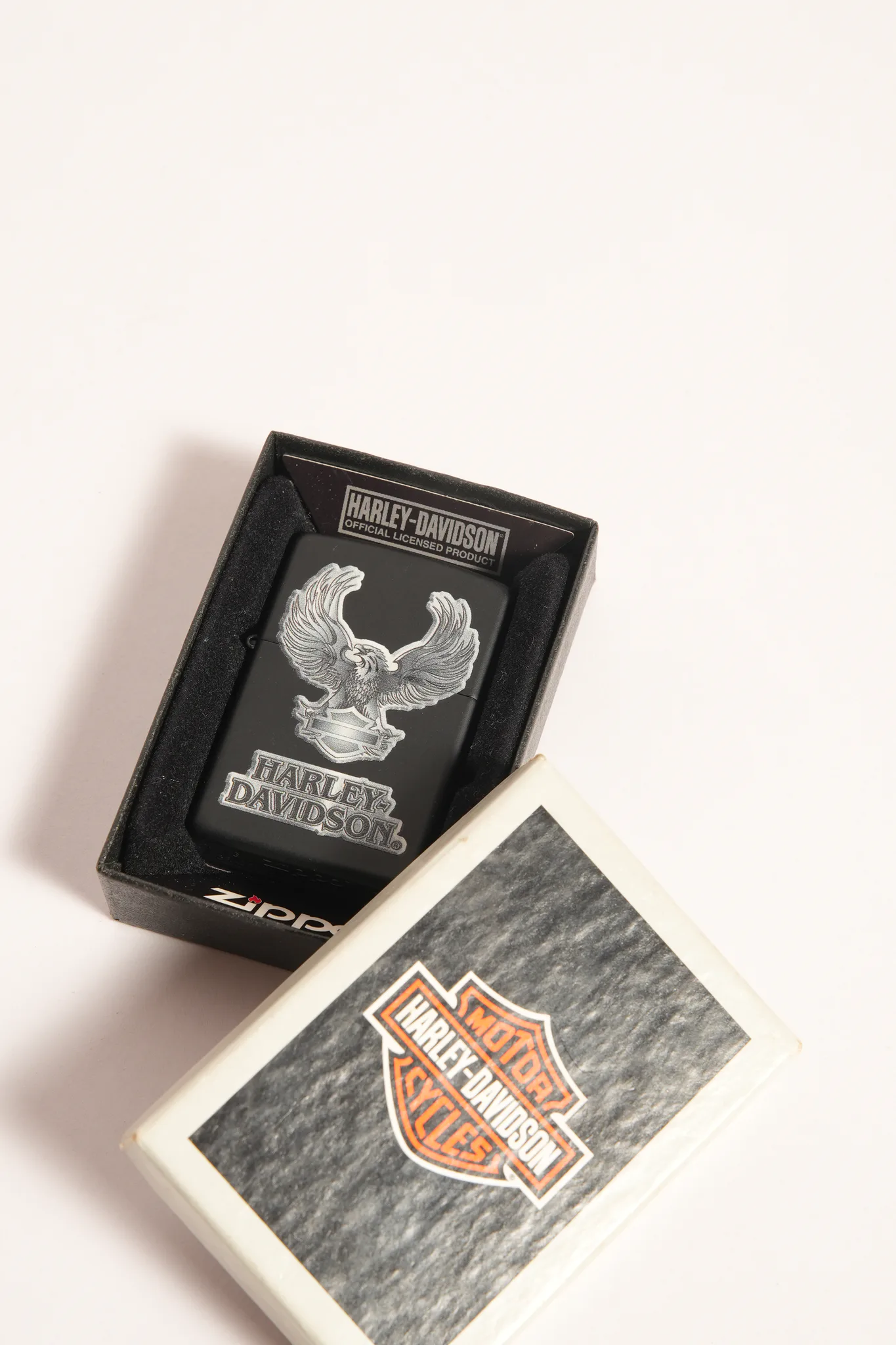 Vintage Zippo Harley-Davidson Eagle Matte Black Lighter — photograph
