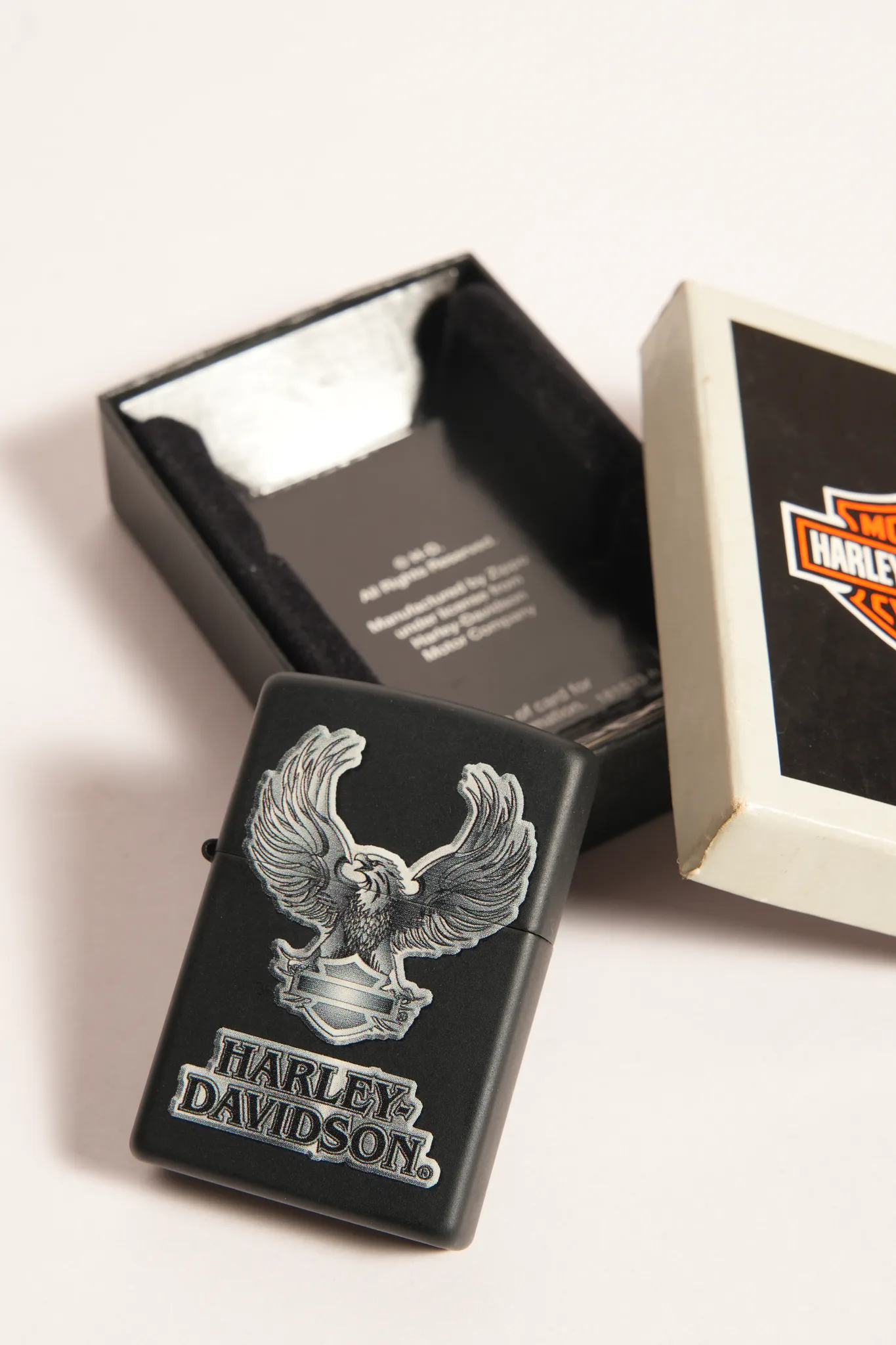 Vintage Zippo Harley-Davidson Eagle Matte Black Lighter — photograph