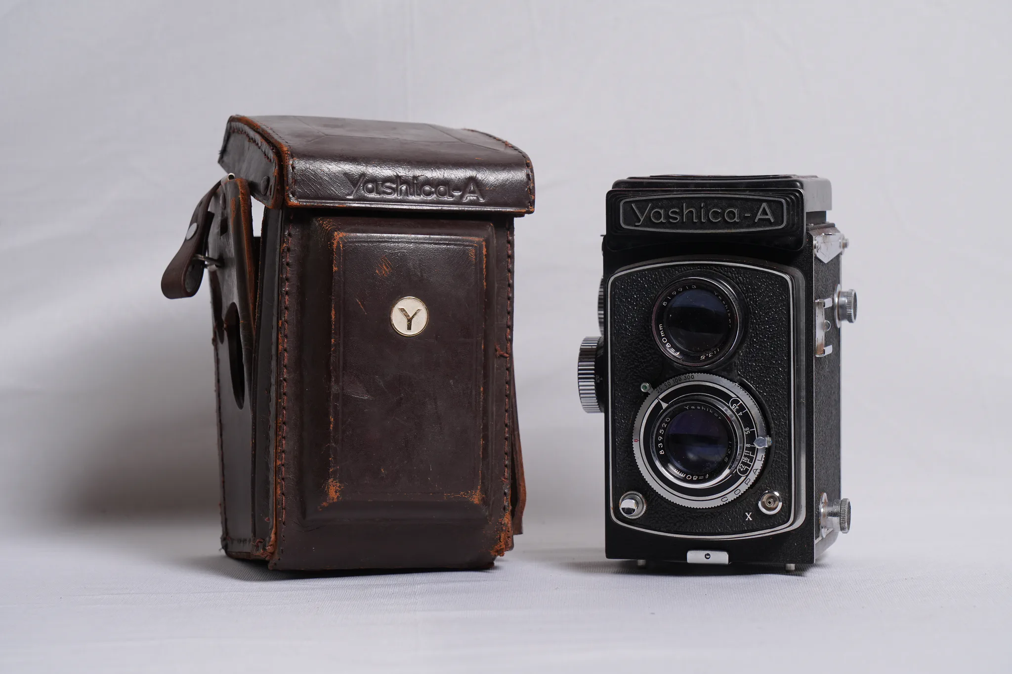 Yashica-A Twin-Lens Reflex Camera with Leather Case — photograph