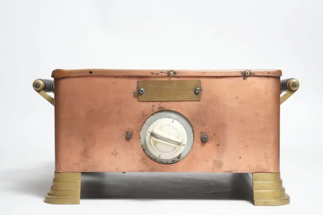 Watcha's Radio-Gram Stores Copper Electric Warmer