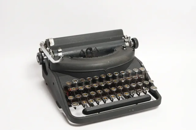 Remington Portable Typewriter with Case