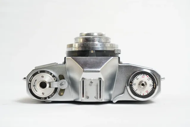 Zeiss Ikon Contaflex Prima 35mm SLR Camera: top controls, engraved dials and chrome finish