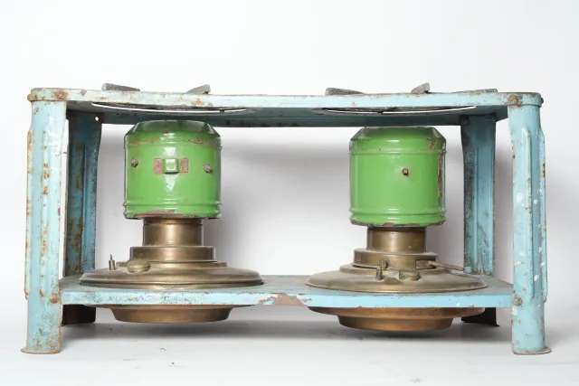 Vintage Dual-Burner Kerosene Stove on Blue Steel Stand