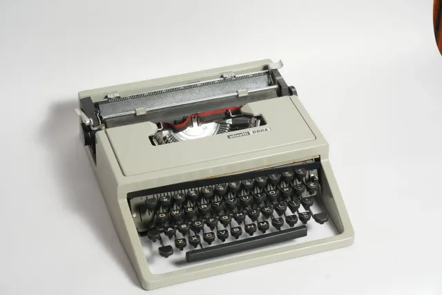 Olivetti Dora Typewriter with Teal Travel Case