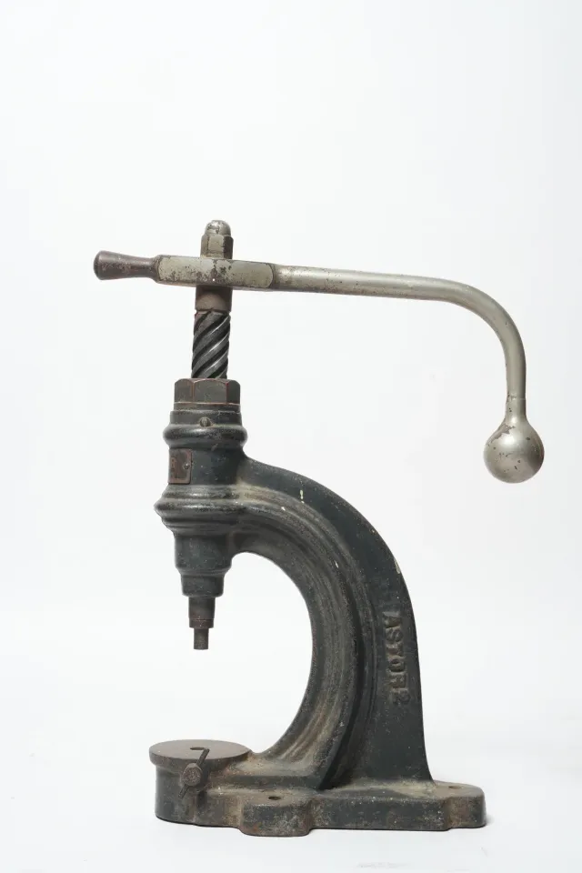 Astor No. 2 Cast Iron Spindle Button Press